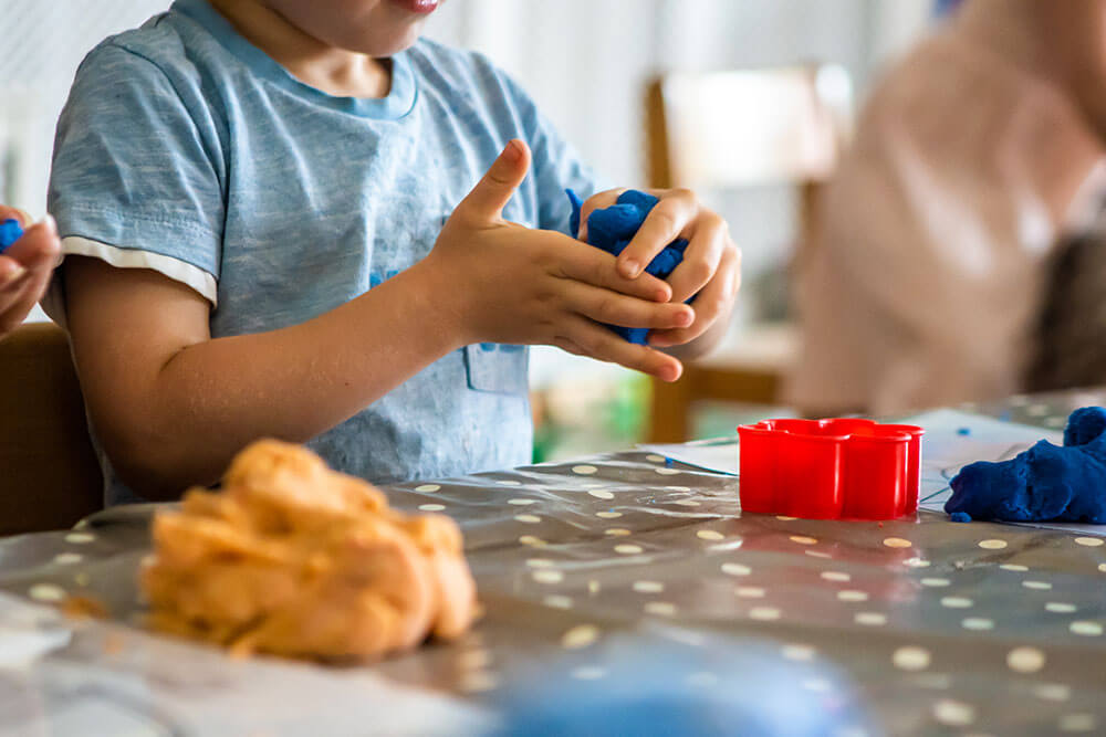 Little Bears Whiteley Village nursery children playing with educational toys