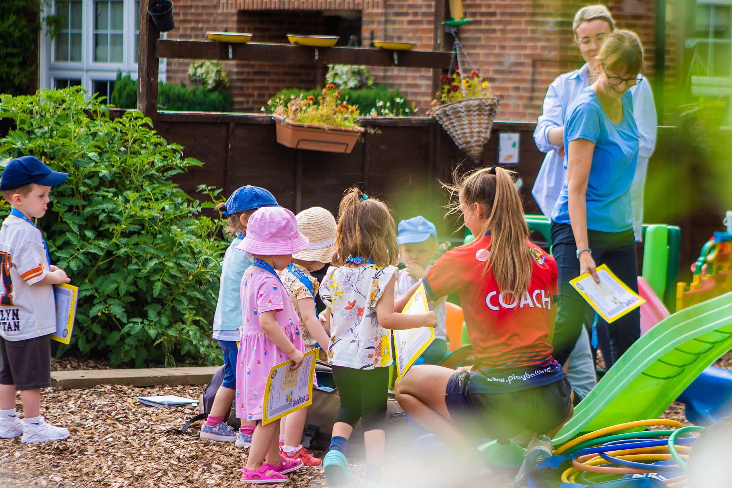 Little Bears Thames Ditton nursery garden which children participating in outdoor learning.